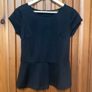 The Limited short sleeved black womens  peplum top. Size small.